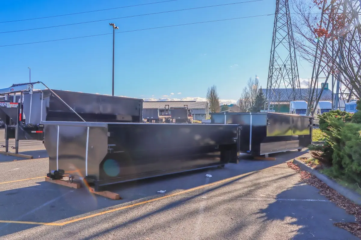 Roll-off dumpster ready for waste disposal at job site for Concrete Dumpster Rental in Columbia